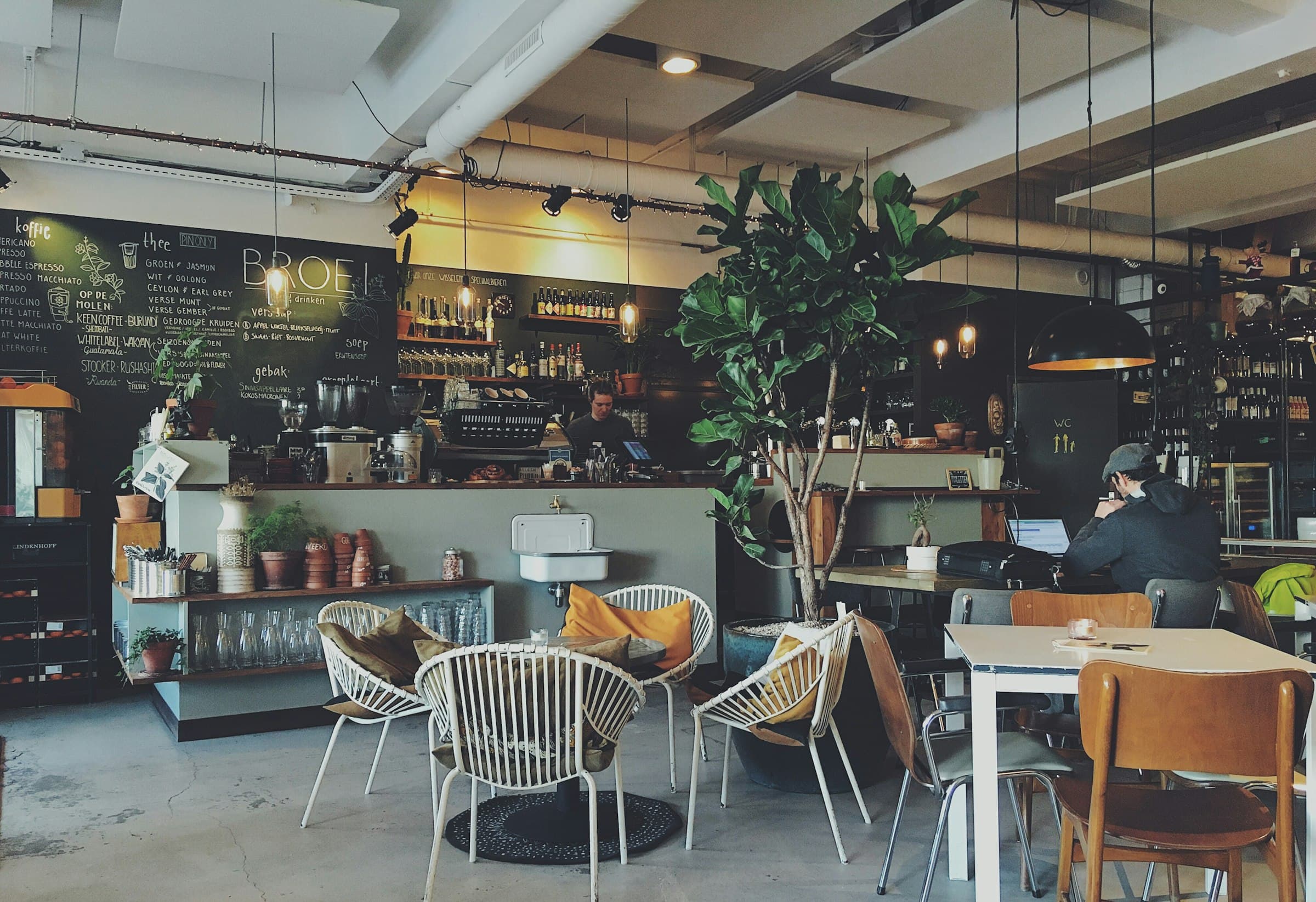 Sunlit cafe interior photographed in Bali